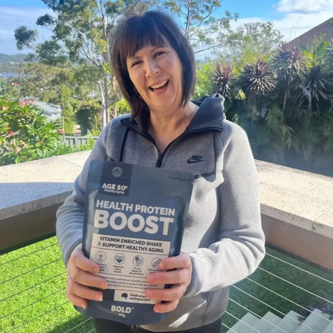 Smiling customer with Health Protein Boost pouch