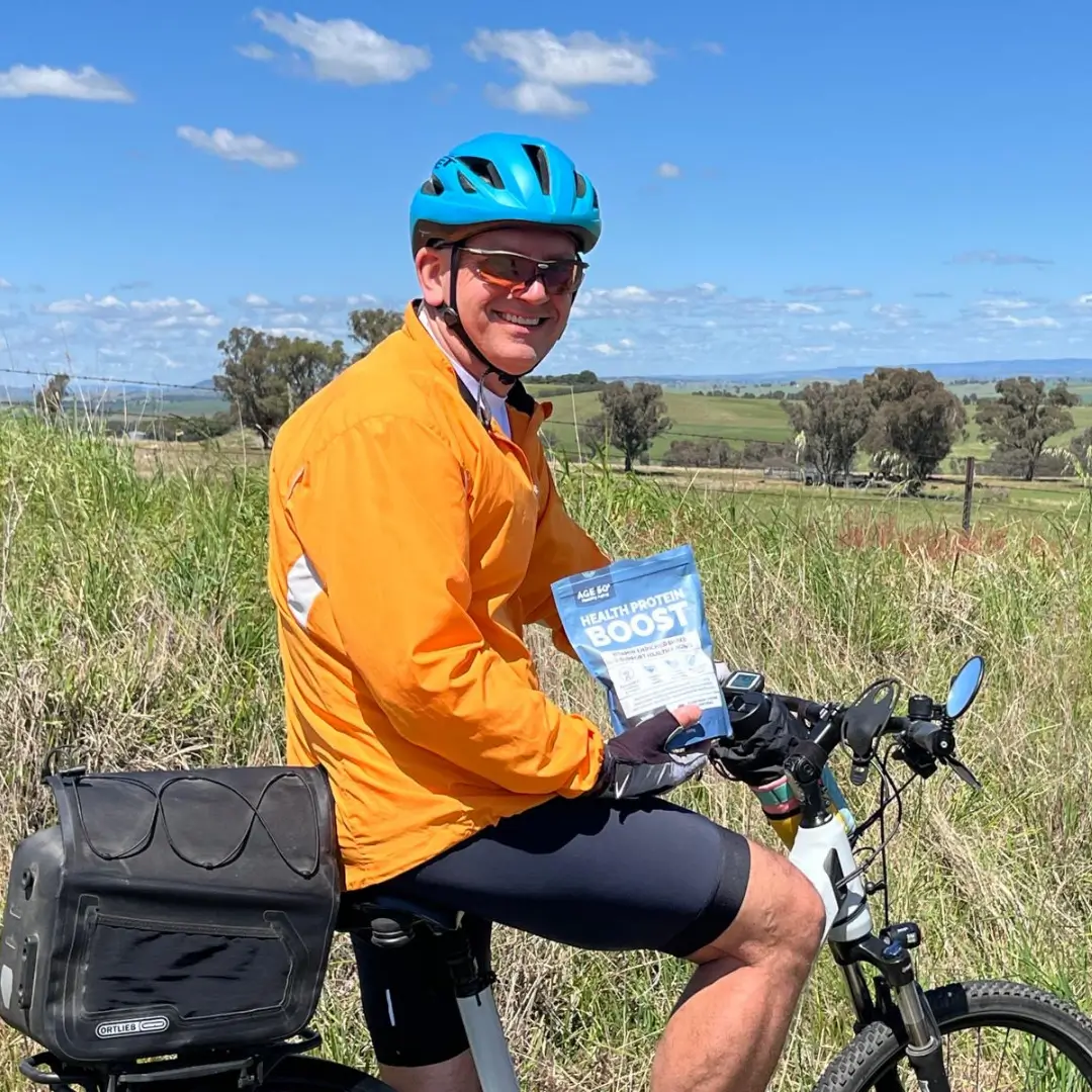 Cyclist on country trail with Health Protein Boost