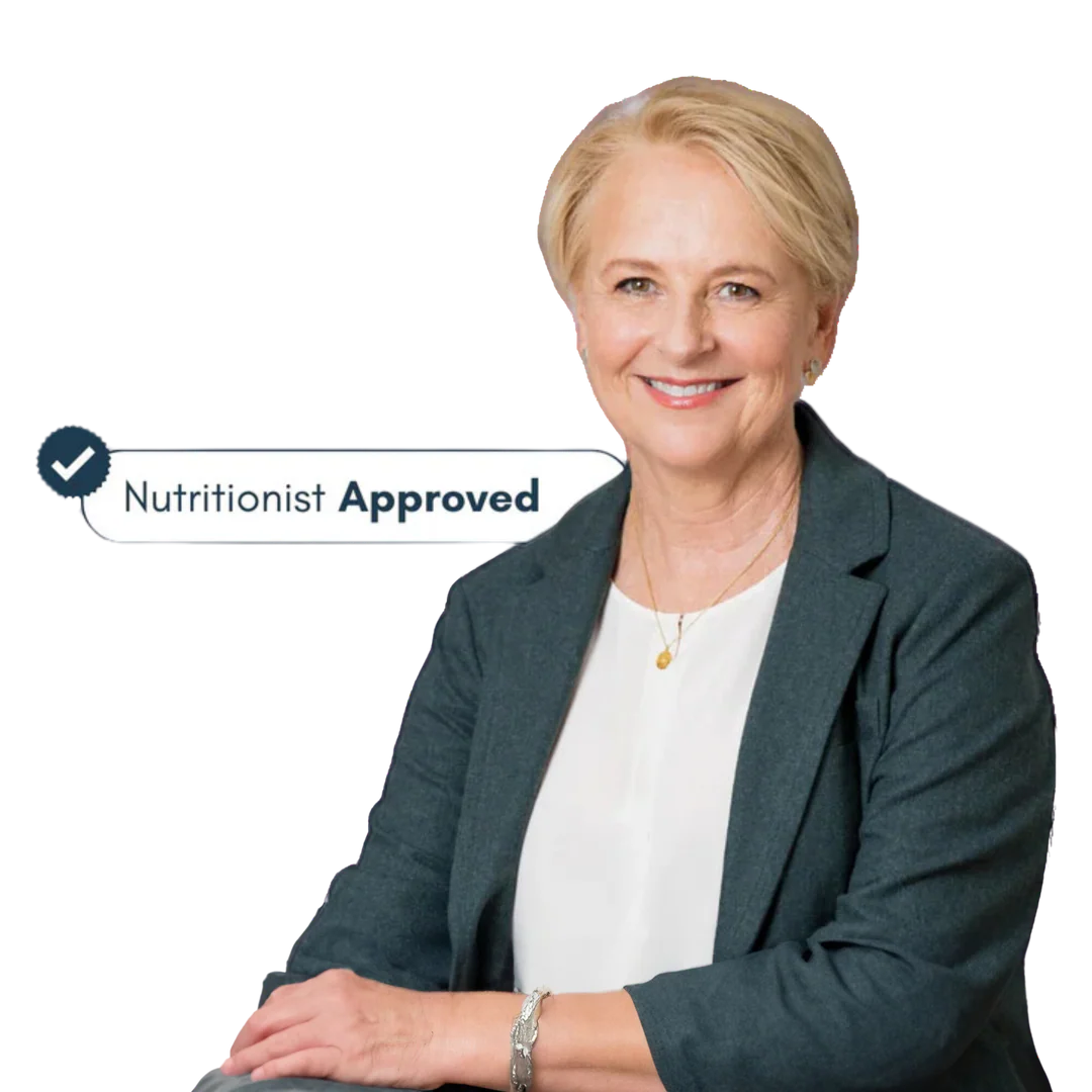 Louise in a blazer with 'Nutritionist Approved' label